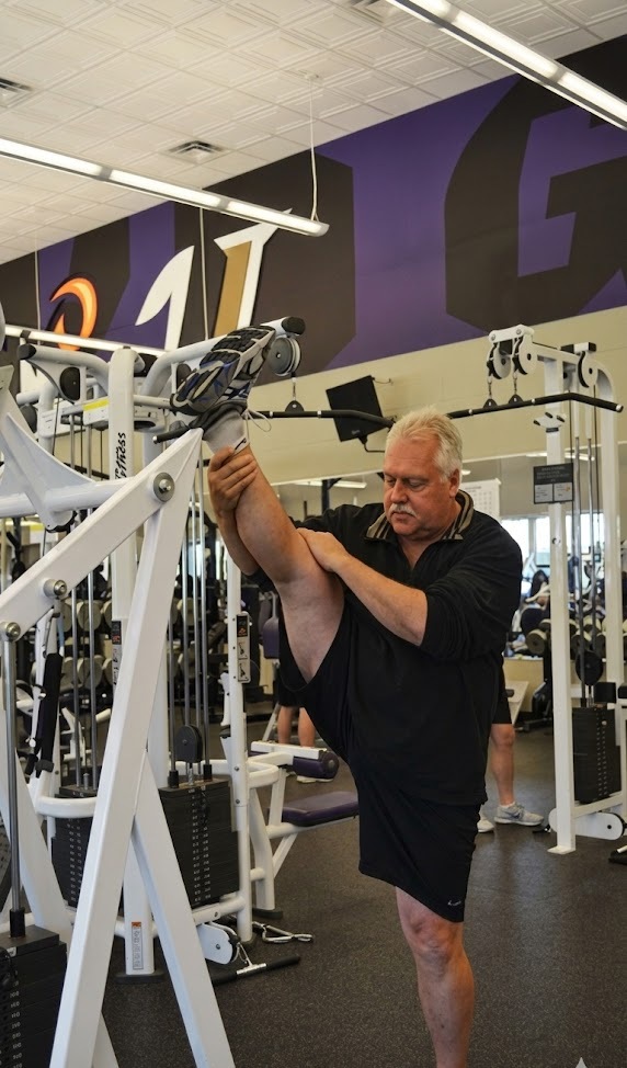 Roger Erickson working on an athlete's recovery